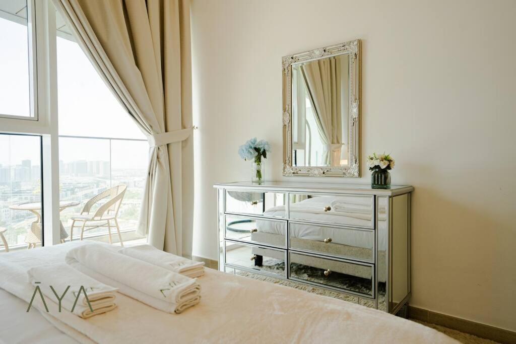 Elegant 1br Retreat With Rooftop Pool In Jvc By Aya Boutique Dubai