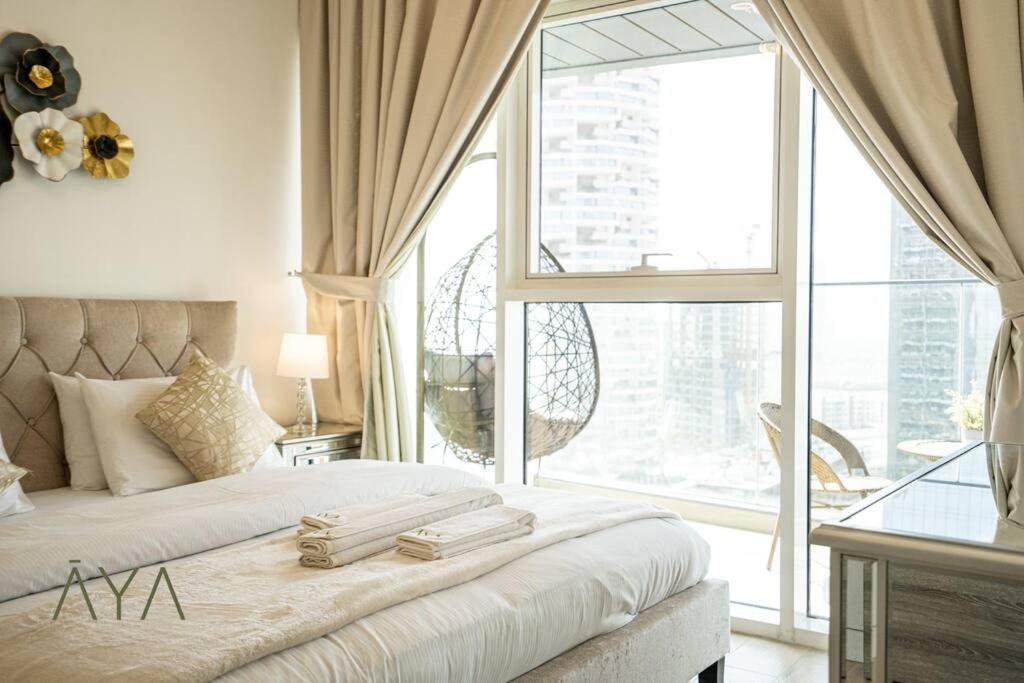 Elegant 1br Retreat With Rooftop Pool In Jvc By Aya Boutique Dubai