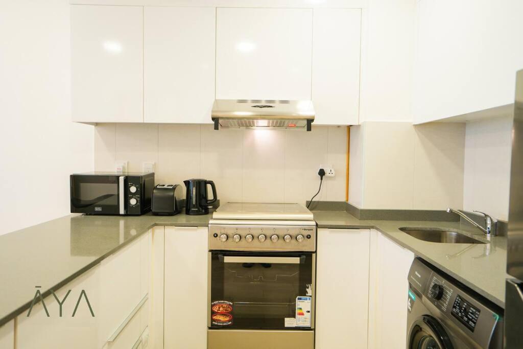Appartement Elegant 1br Retreat With Rooftop Pool In Jvc By Aya Boutique Dubai