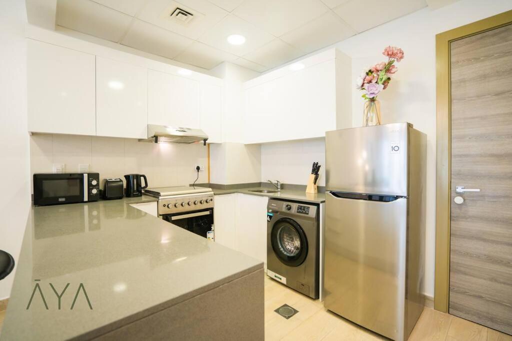 Elegant 1br Retreat With Rooftop Pool In Jvc By Aya Boutique *