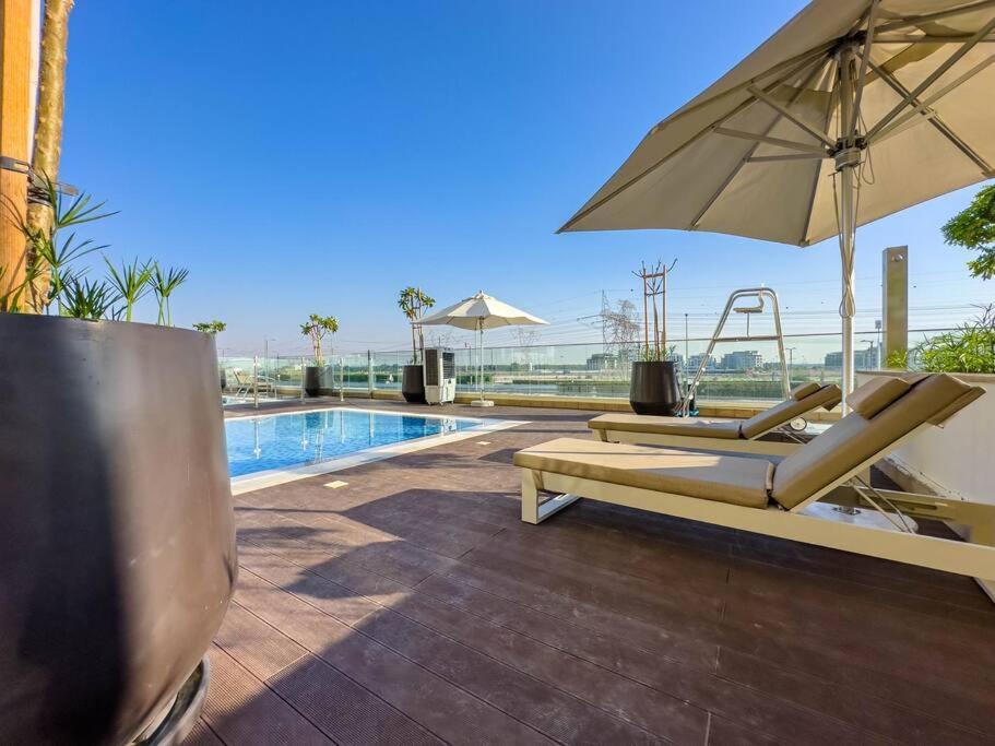 Apartamento Naseem Modern Comforts 1-bedroom Retreat In Meydan *
