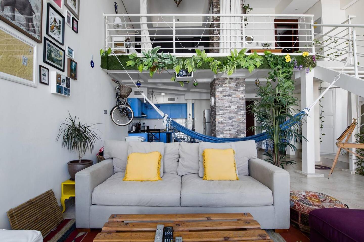 Urban Oasis Stylish Loft Abundant Natural Light