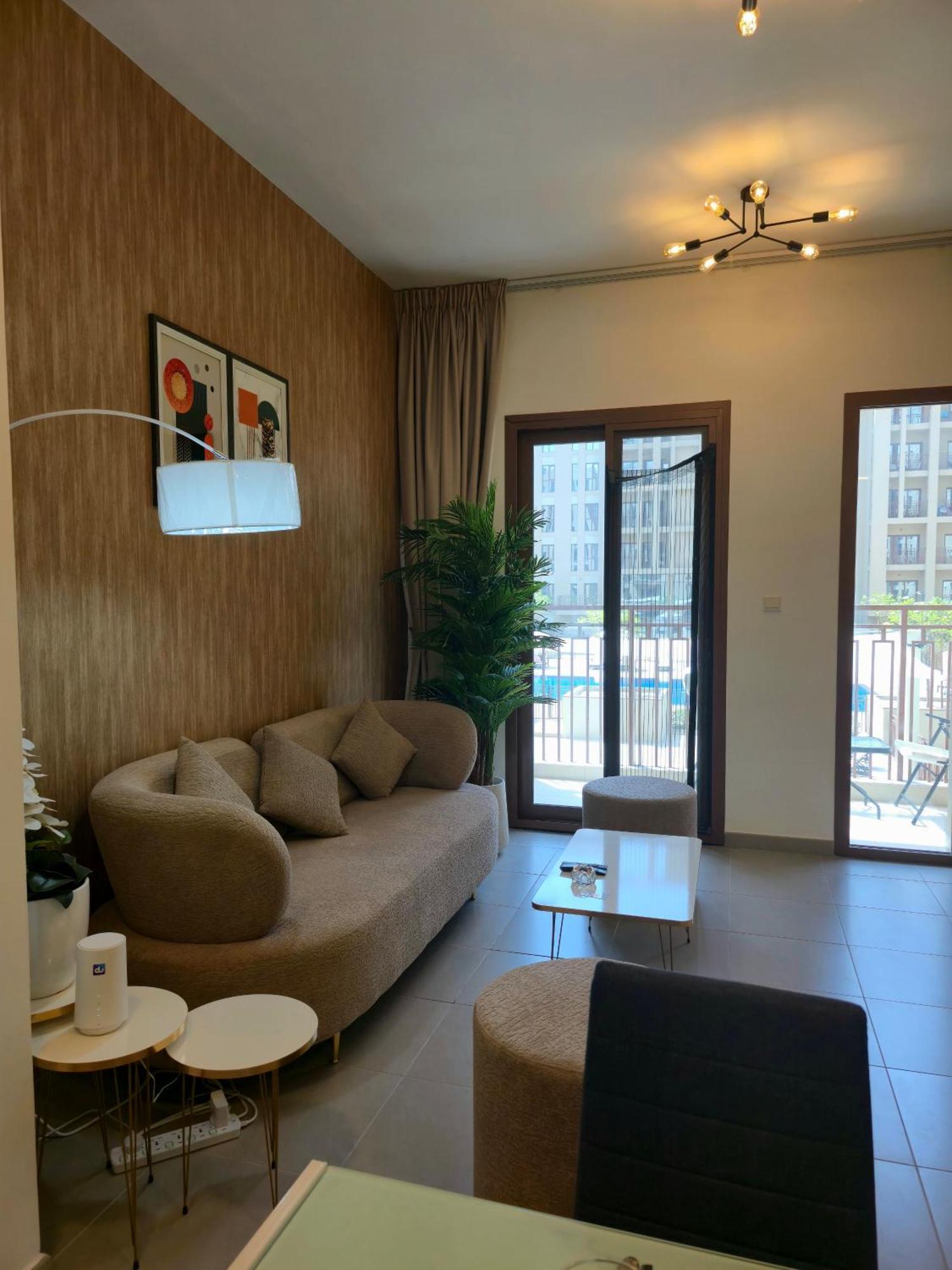 Bareez Bliss Retreat Elegant 2br With Balcony, Pool & Park View