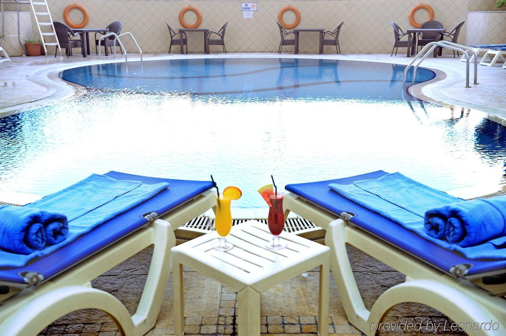 Lotus Downtown Metro Apartahotel 4*