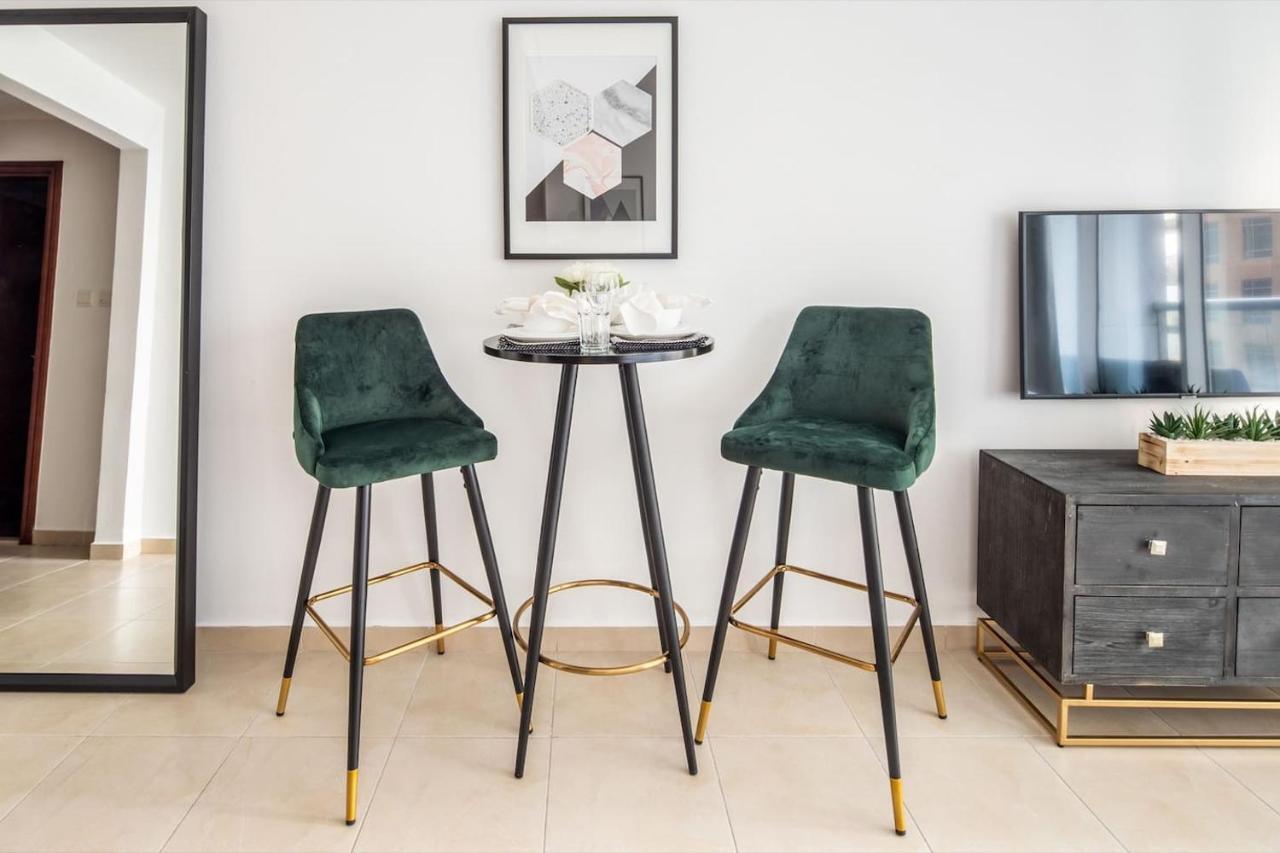 Frank Porter - Burj Al Noujoum Apartamento