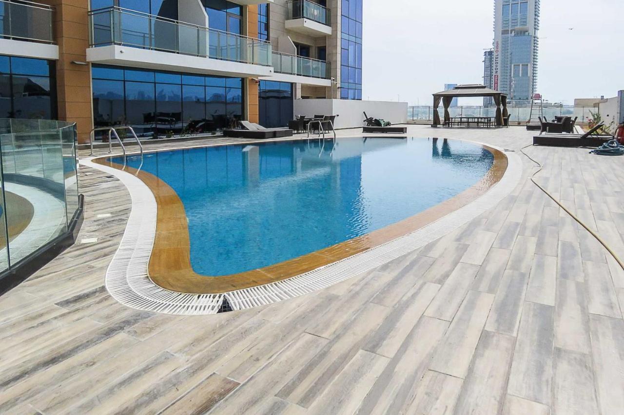 Oyo 860 Studio Apartment, Maya Tower 4, Jumeirah Village Triangle Gasthuis Dubai