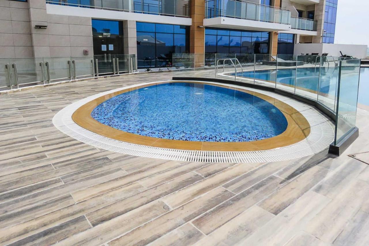 Oyo 860 Studio Apartment, Maya Tower 4, Jumeirah Village Triangle Gasthuis *