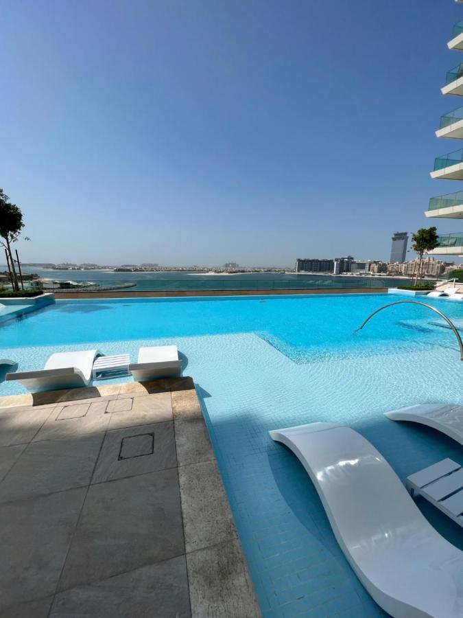 Stunning 1br Apt High Floor With Palm View & Private Beach At Emaar Beachfront