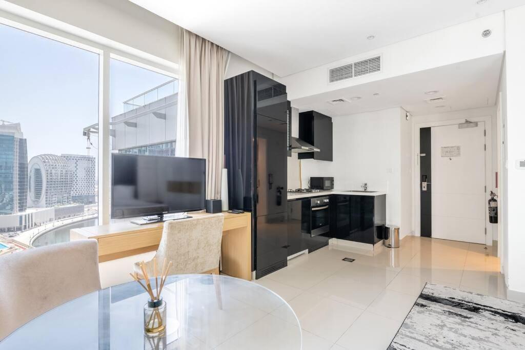 Studio Canal View With Partial Burj Khalifa View 5min To Mall *